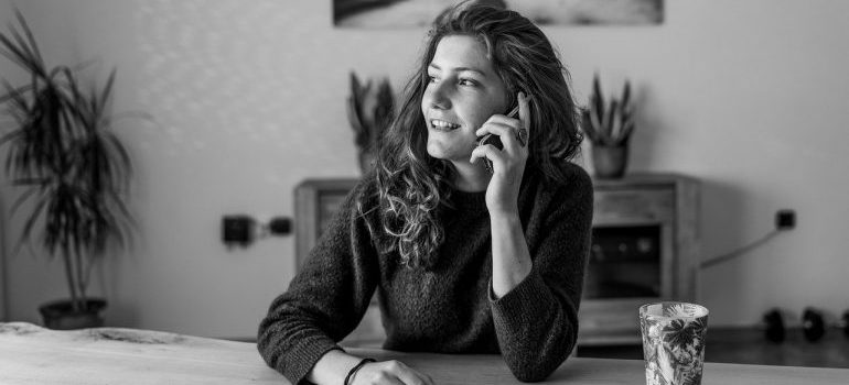 A woman making a phone call.