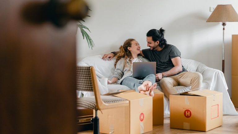 A happy couple attempting to settle after moving to Burlington.