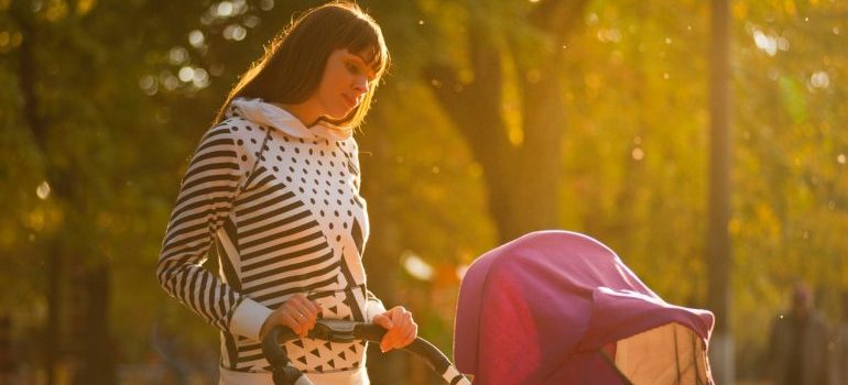 A woman and a baby in the park