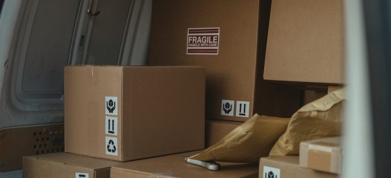 Labeled boxes loaded in a moving vehicle