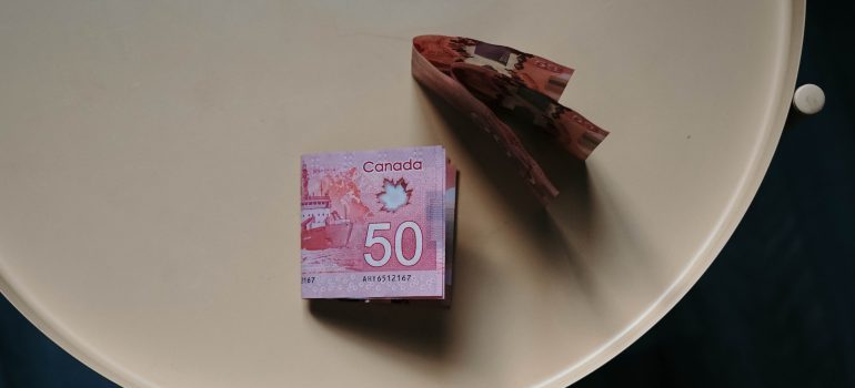 Canadian dollars on a plate
