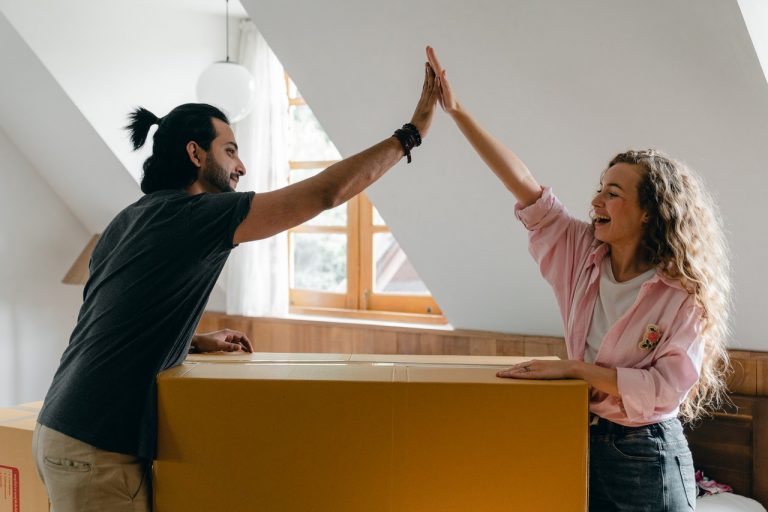 A couple moving from Midtown Toronto to Hamilton packing
