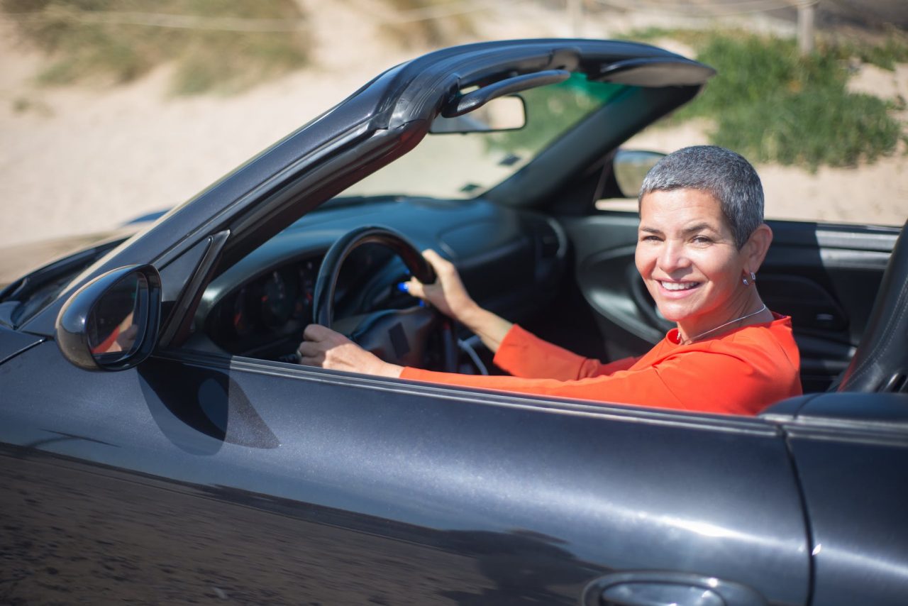 smiling woman driving