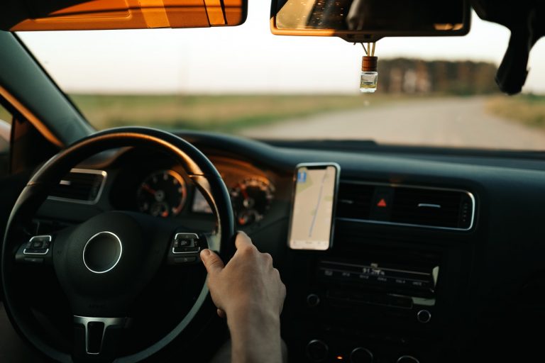a man driving a car