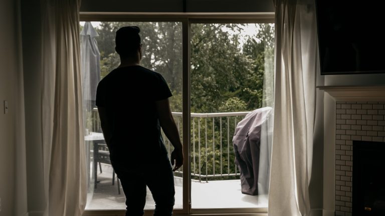 A man looking outside