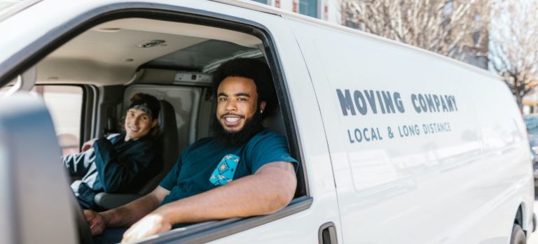 Two men in a moving van