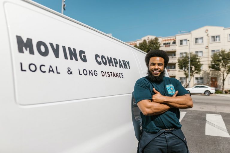 Man leaning on a moving van