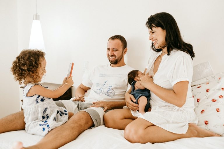 a family sitting and talking about the best cities to live in ontario for you and your family