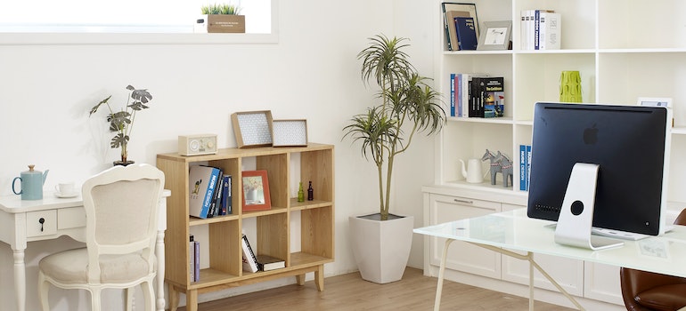 A living room with different pieces of furniture
