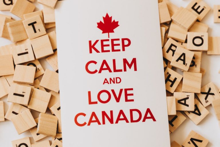Keep calm and love Canada note on paper