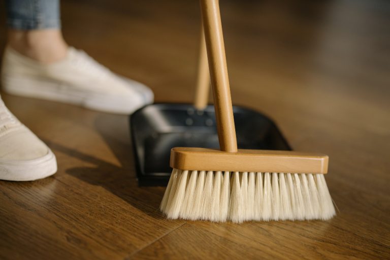 A person mopping the floor