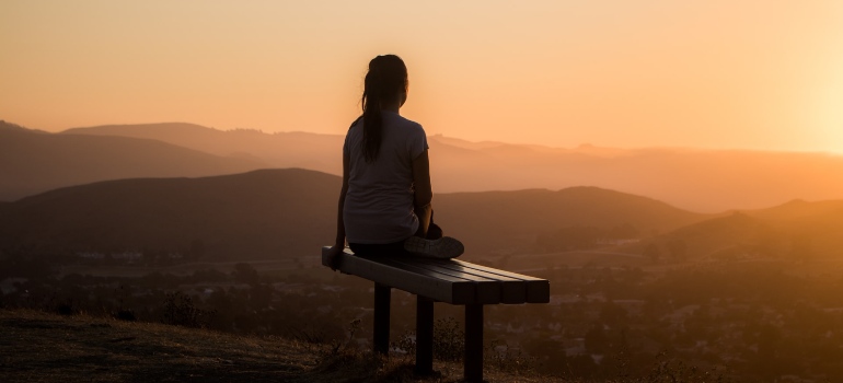 A woman relaxing as one of examples of reasons people move from Toronto to Ottawa