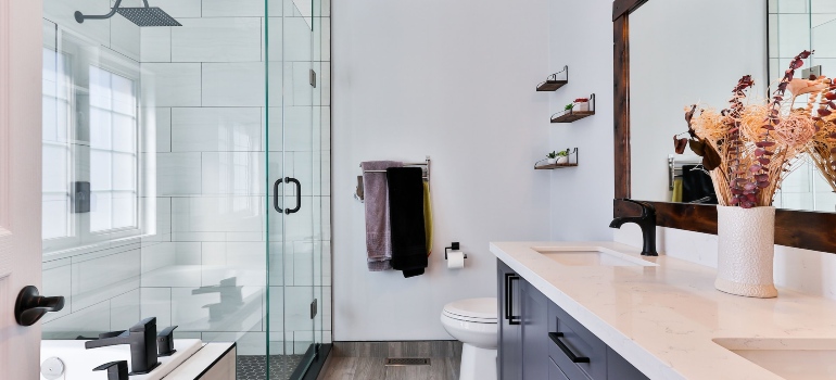 A nice looking white bathroom as a big part of room-by-room packing guide