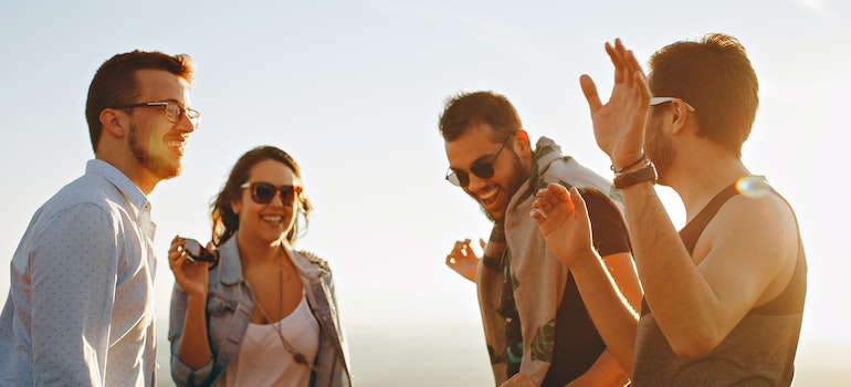 People laughing and enjoying cultural differences between Toronto and Ottawa