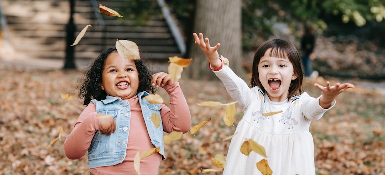 Two girls playing in a park