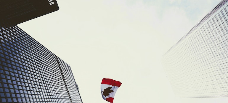 Canada flag between the buildings