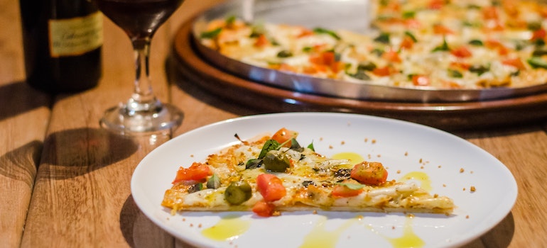 A slice of pizza on a plate