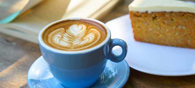 Coffee and a piece of cake on a table