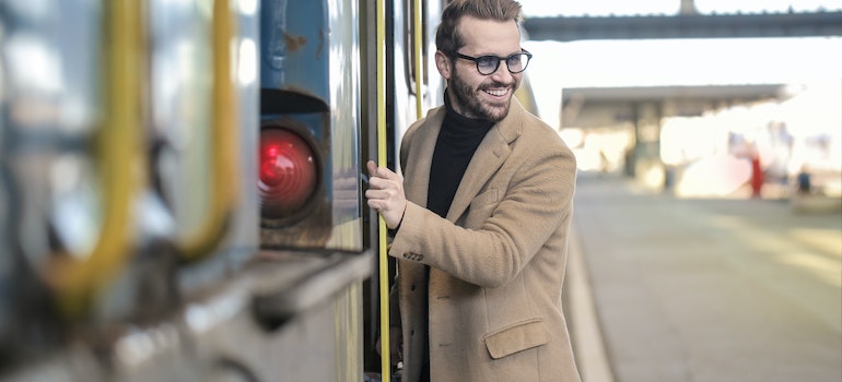 A mna about to enter a train