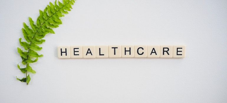 The word healthcare written on a white surface