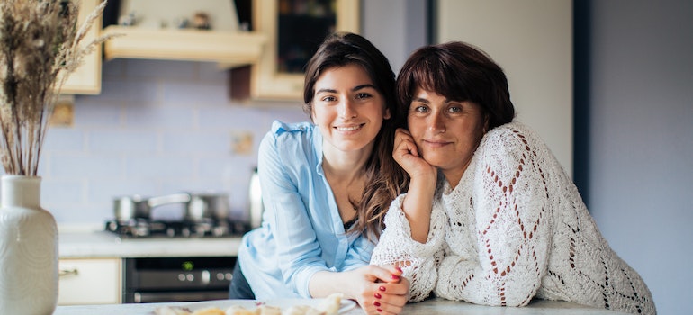 A woman and a girl in the kitchen