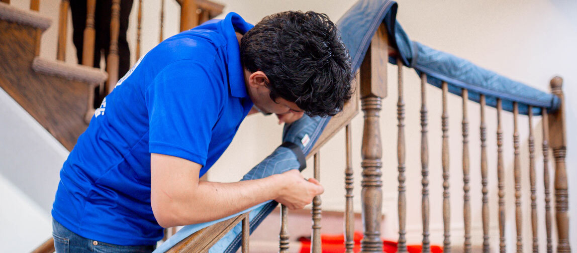 one of the best movers in Toronto covering a staircase rail