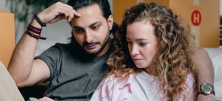 a couple making a plan for downsizing in Toronto
