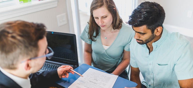 families moving from East York to Mississauga consulting an expert to help them plan their budget