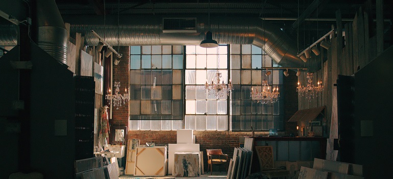 an art studio with packed up art 
