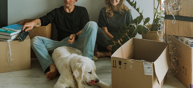 a family packing their belongings 