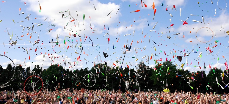 graduation caps flying all around