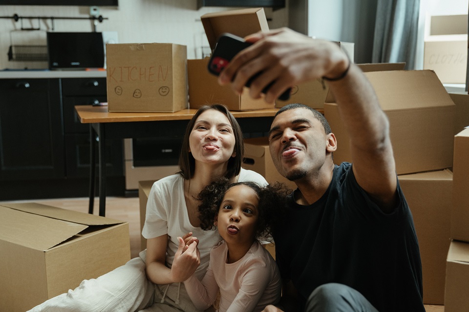 a happy family preparing for a move