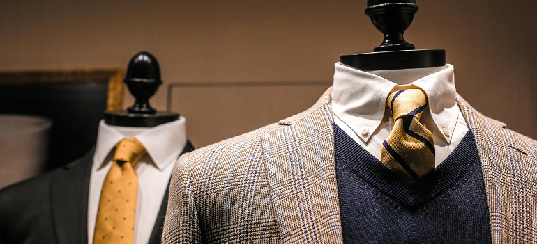 fancy suits in a shop window