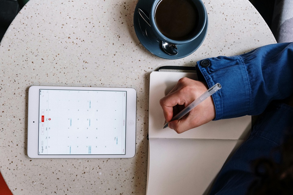 a man creating a schedule for his relocation