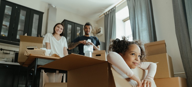 parents and their daughter during their family move to Toronto suburbs