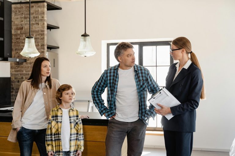 a family taking to a realtor
