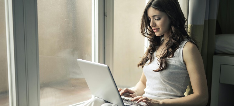 a girl using her laptop 