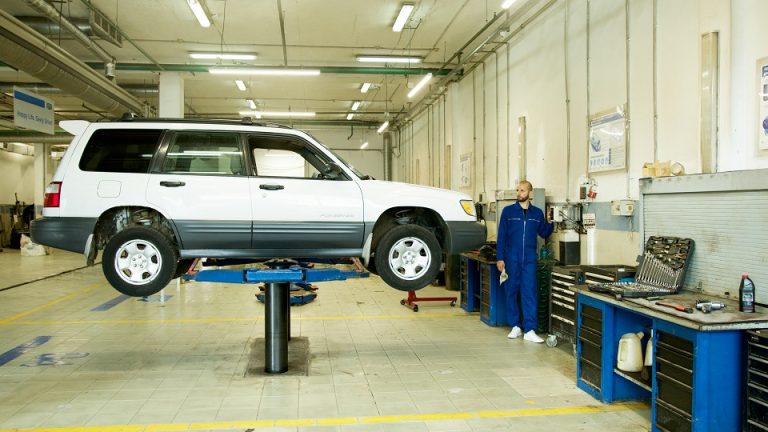 a worker in a car shop