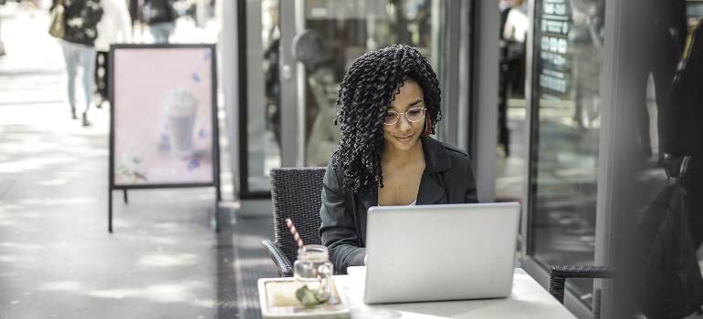 a girl using her laptop in one of the office parks in the GTA suburbs