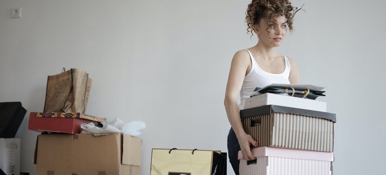 a girl thinking about mistakes of moving in Toronto during the summer