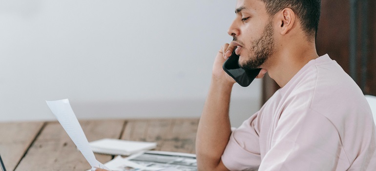 a man hiring commercial movers Canada trusts 