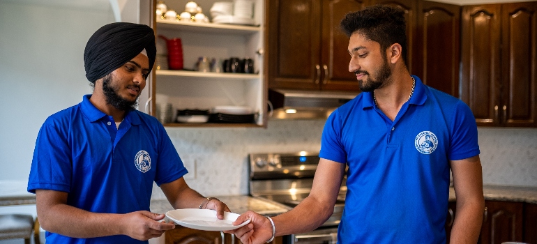 condo movers Toronto holding a plate