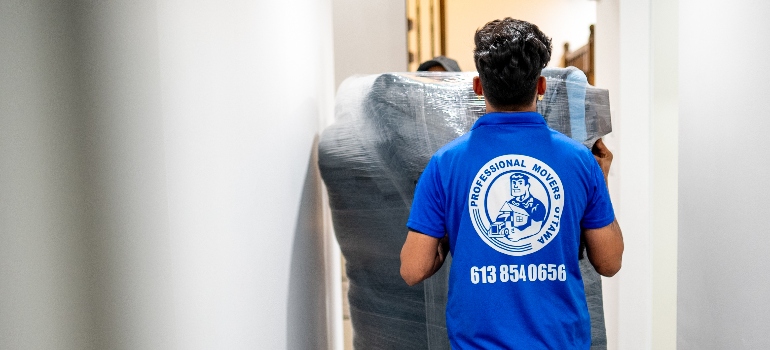 movers carrying furniture  