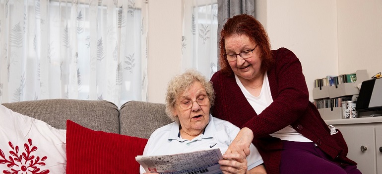 two ladies talking about moving from Aurora to Ajax for seniors
