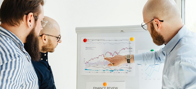 a man talking to his employees 