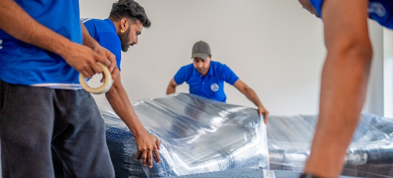 movers packing furniture 