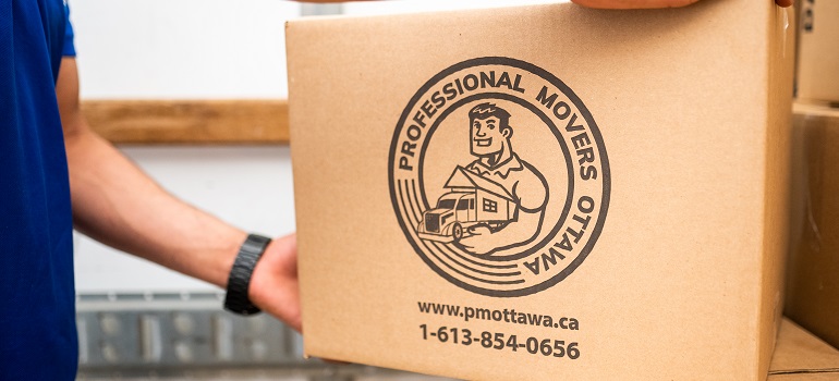 someone attempting DIY packing during their move 