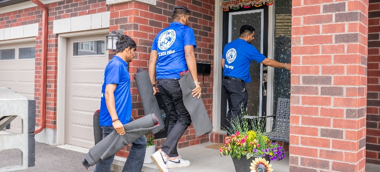 movers entering a home