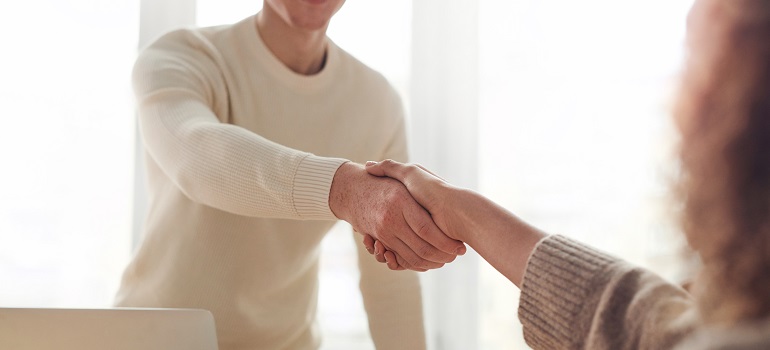people shaking hands 