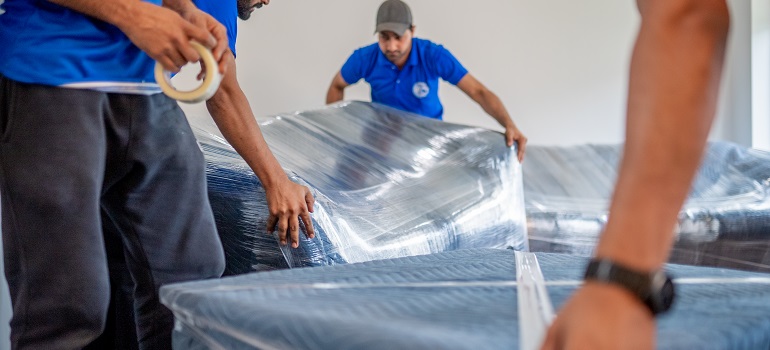 Bowmanville movers packing furniture